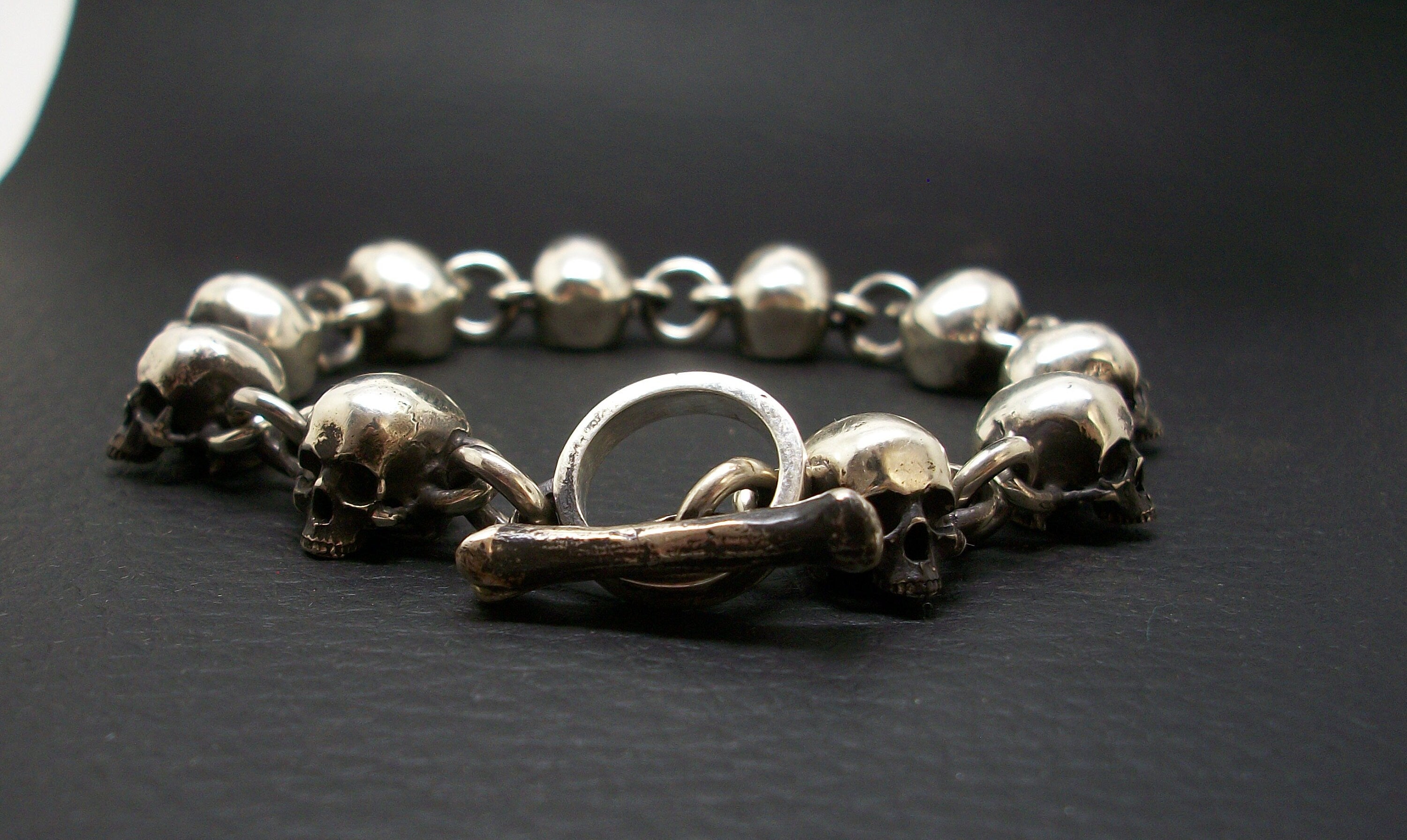 Skull Bracelet - Sterling Silver skull bracelet chain. Toggle bone closure.