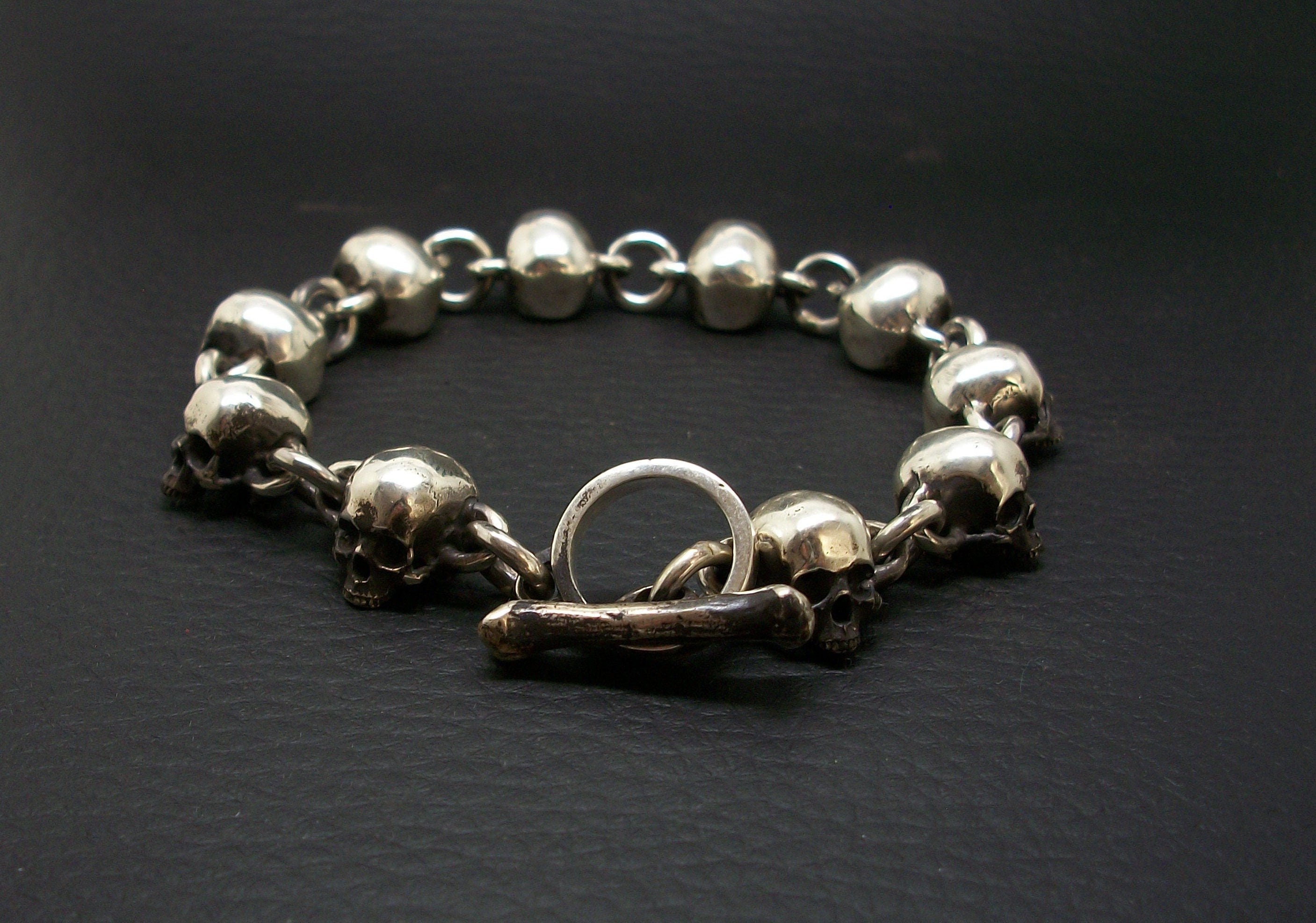 Skull Bracelet - Sterling Silver skull bracelet chain. Toggle bone closure.