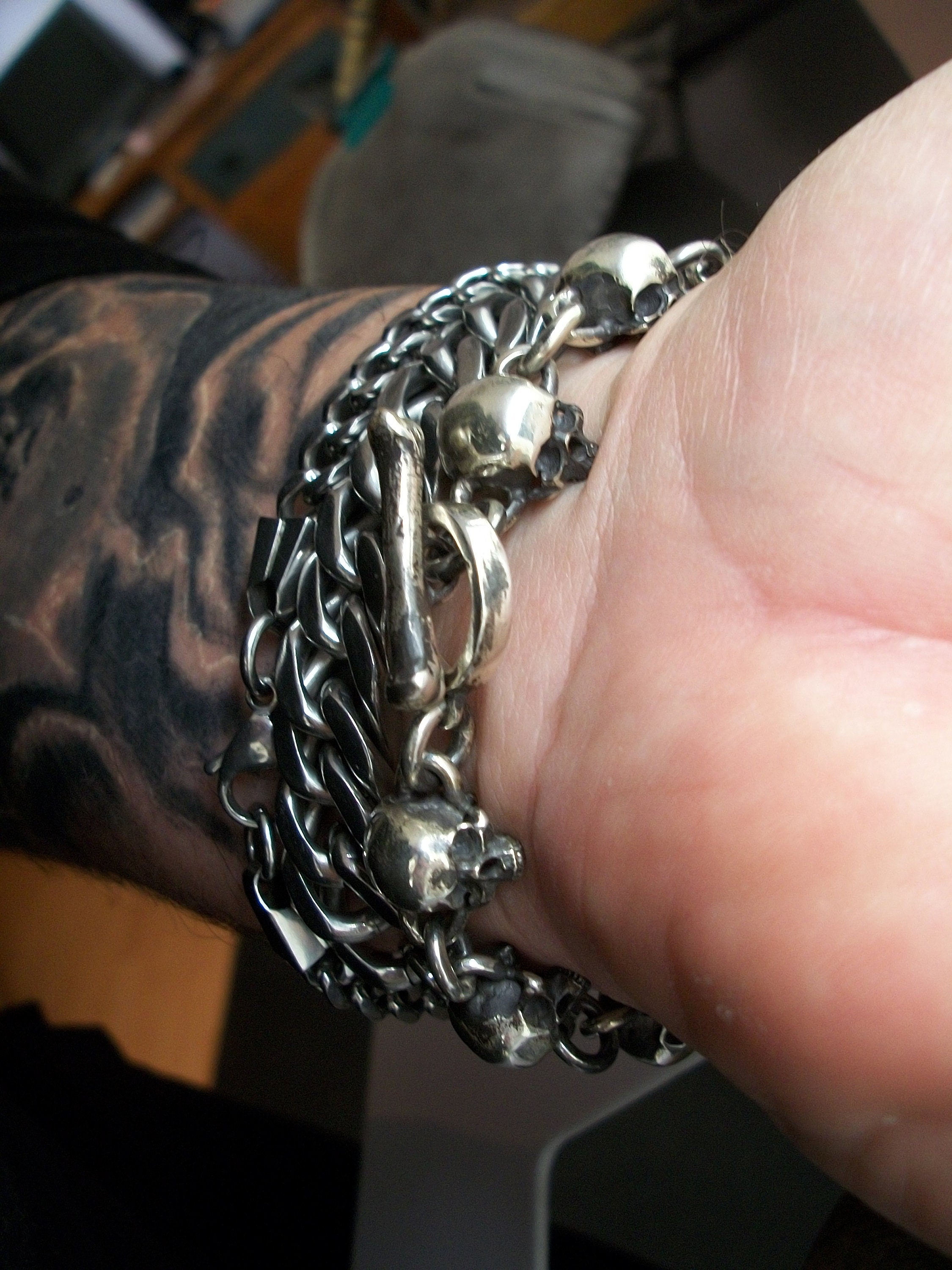 Skull Bracelet - Sterling Silver skull bracelet chain. Toggle bone closure.