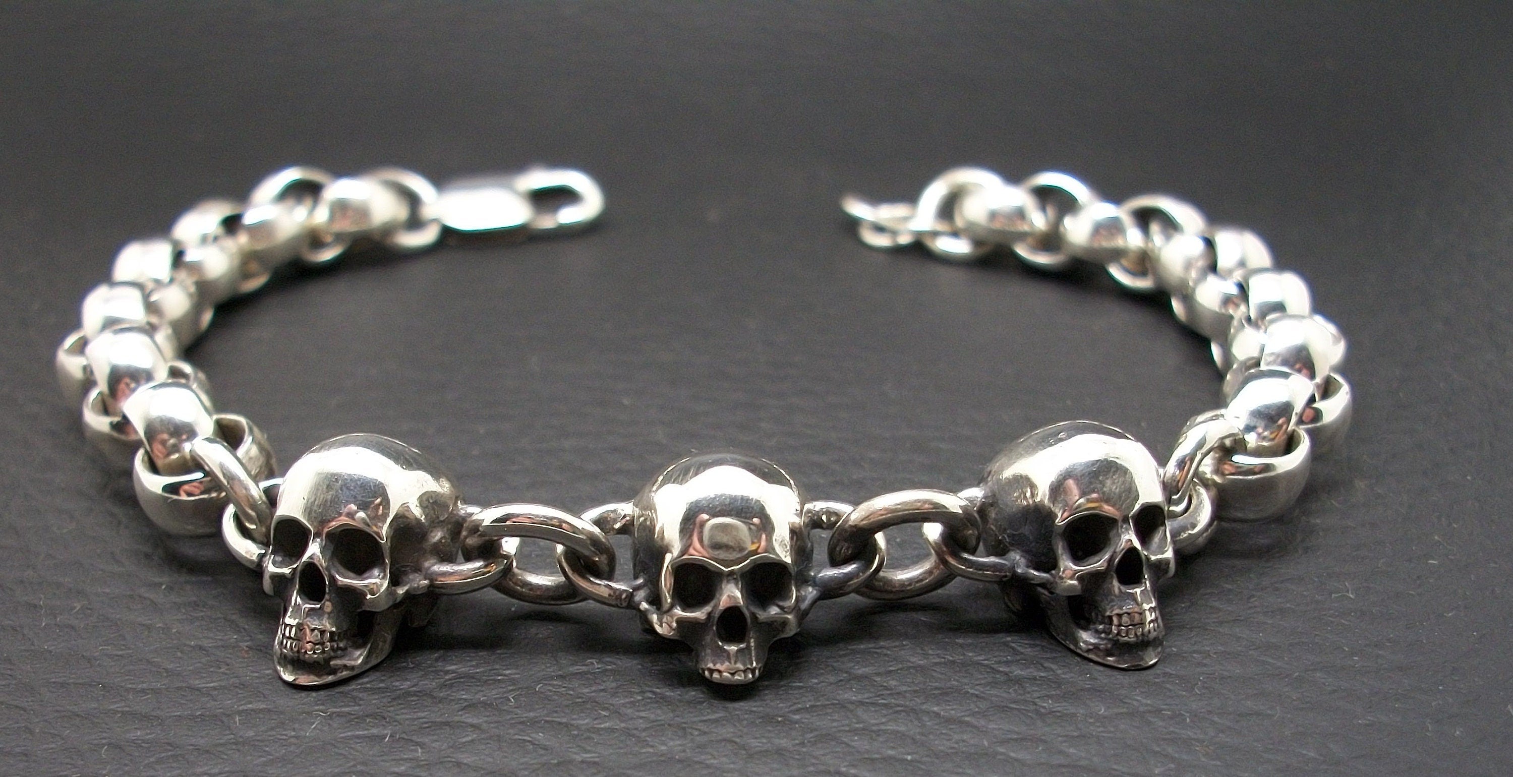 Skull Bracelet - Sterling Silver skull bracelet rolo chain. Lobster clasp closure.