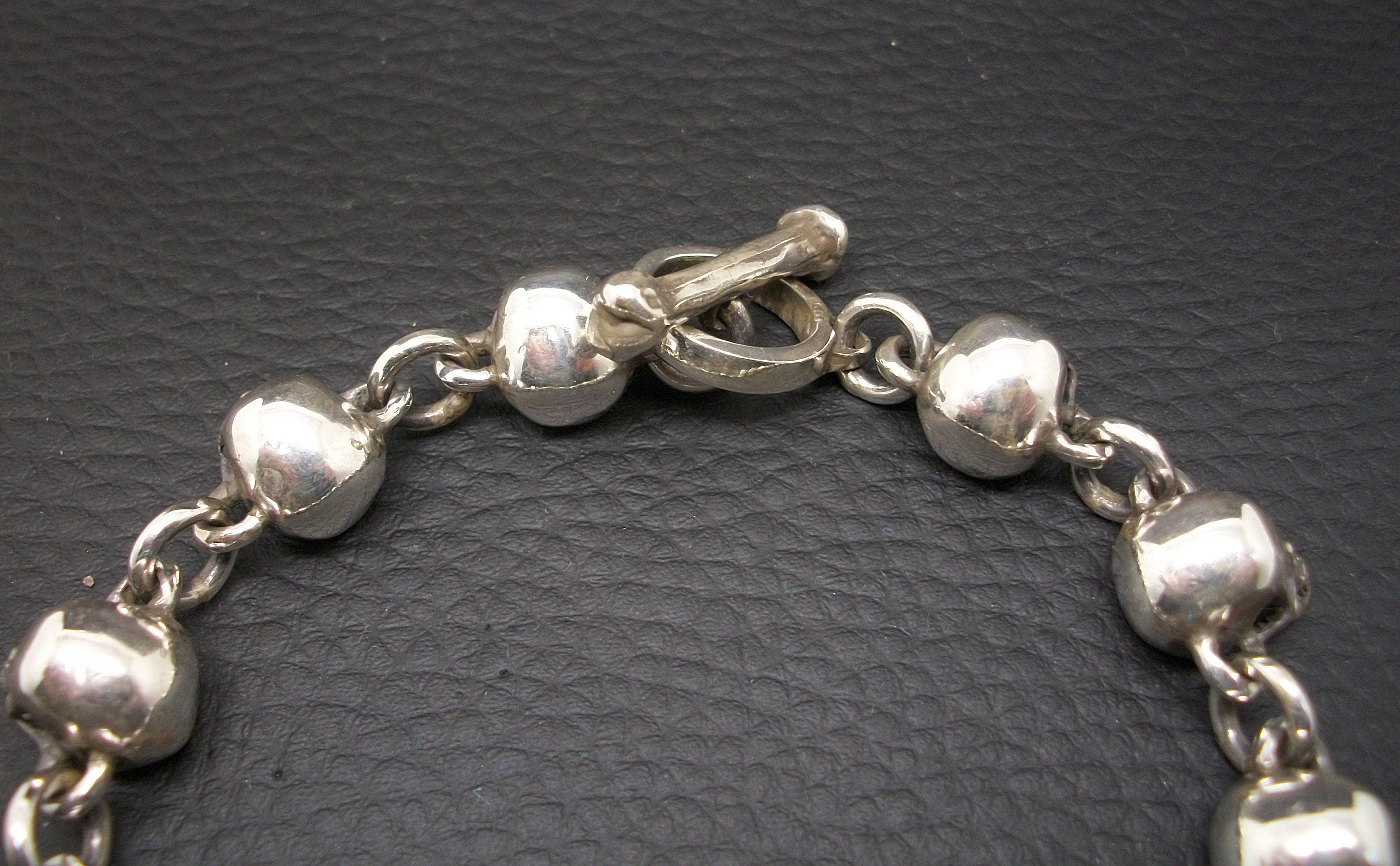 Skull Bracelet - Sterling Silver skull bracelet chain. Toggle bone closure. Full Jaw Skull