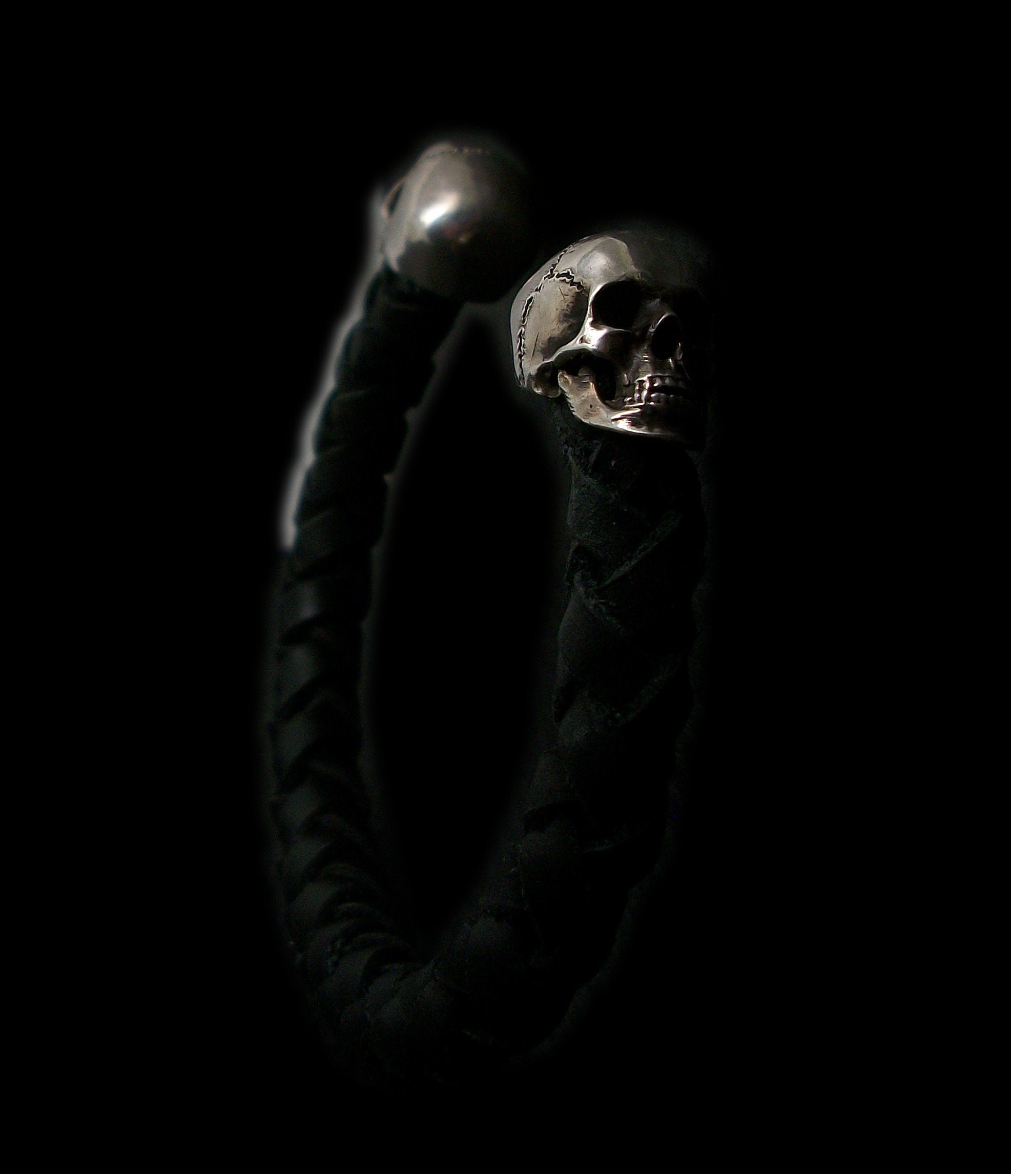 Skull Bracelet - Sterling Silver skulls - Black braided leather  - Open cuff